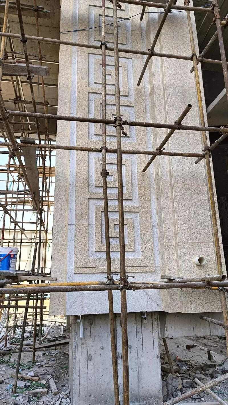 兰州 黄金麻花岗岩别墅外墙干挂回纹造型效果